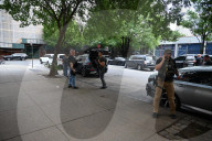 Members Of The United States Marshal Service Regional Fugitive Task Force Gather At The Scene Following The Arrest Of A 62-year-old Man Identified As Audwin Caines On West 142nd Street