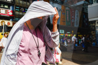 Tropical Cyclone Brings Hot Weather To Hong Kong