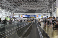 Passengers At The Terminal Of Brussels Airport