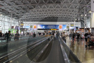 Passengers At The Terminal Of Brussels Airport