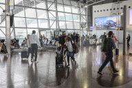 Passengers At The Terminal Of Brussels Airport