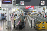 Passengers At The Terminal Of Brussels Airport