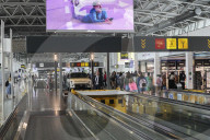 Passengers At The Terminal Of Brussels Airport