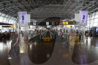 Passengers At The Terminal Of Brussels Airport
