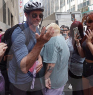 Hugh Jackman Spotted By Midtown Crowd Wearing Cycle Helmet In New York City - 18 Jul 2025