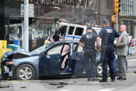 Two People Were Killed When An Out-of-control Car With Stolen License Plates Vaulted Onto A Bustling Chinatown Sidewalk Saturday Morning At Canal Street And Bowery Street