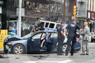 Two People Were Killed When An Out-of-control Car With Stolen License Plates Vaulted Onto A Bustling Chinatown Sidewalk Saturday Morning At Canal Street And Bowery Street