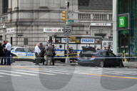 Two People Were Killed When An Out-of-control Car With Stolen License Plates Vaulted Onto A Bustling Chinatown Sidewalk Saturday Morning At Canal Street And Bowery Street