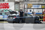 Two People Were Killed When An Out-of-control Car With Stolen License Plates Vaulted Onto A Bustling Chinatown Sidewalk Saturday Morning At Canal Street And Bowery Street