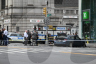 Two People Were Killed When An Out-of-control Car With Stolen License Plates Vaulted Onto A Bustling Chinatown Sidewalk Saturday Morning At Canal Street And Bowery Street