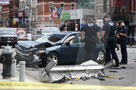 Two People Were Killed When An Out-of-control Car With Stolen License Plates Vaulted Onto A Bustling Chinatown Sidewalk Saturday Morning At Canal Street And Bowery Street