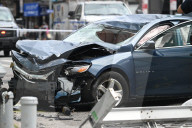 Two People Were Killed When An Out-of-control Car With Stolen License Plates Vaulted Onto A Bustling Chinatown Sidewalk Saturday Morning At Canal Street And Bowery Street