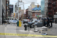 Two People Were Killed When An Out-of-control Car With Stolen License Plates Vaulted Onto A Bustling Chinatown Sidewalk Saturday Morning At Canal Street And Bowery Street