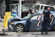 Two People Were Killed When An Out-of-control Car With Stolen License Plates Vaulted Onto A Bustling Chinatown Sidewalk Saturday Morning At Canal Street And Bowery Street
