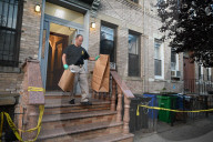 Evidence Is Collected And A Memorial Is Held Following A Tragedy Where A Man Stabbed His Wife And Two-year-old Daughter To Death And Wounds Himself In A Domestic Related Murder-suicide Attack At 63-35 Forest Avenue