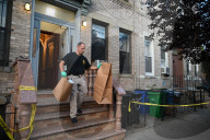 Evidence Is Collected And A Memorial Is Held Following A Tragedy Where A Man Stabbed His Wife And Two-year-old Daughter To Death And Wounds Himself In A Domestic Related Murder-suicide Attack At 63-35 Forest Avenue