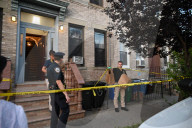 Evidence Is Collected And A Memorial Is Held Following A Tragedy Where A Man Stabbed His Wife And Two-year-old Daughter To Death And Wounds Himself In A Domestic Related Murder-suicide Attack At 63-35 Forest Avenue