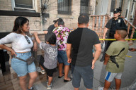Evidence Is Collected And A Memorial Is Held Following A Tragedy Where A Man Stabbed His Wife And Two-year-old Daughter To Death And Wounds Himself In A Domestic Related Murder-suicide Attack At 63-35 Forest Avenue