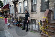 Evidence Is Collected And A Memorial Is Held Following A Tragedy Where A Man Stabbed His Wife And Two-year-old Daughter To Death And Wounds Himself In A Domestic Related Murder-suicide Attack At 63-35 Forest Avenue