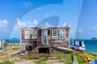 Hurricane-hit Grenadians see climate change and reparations as one struggle.