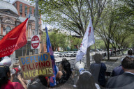 Crowed Of People Gathered Out Side The White House Protesting The Meeting President Donald Trump  And President Bongbong Marcosof 