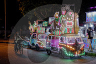 Indonesia: Neon Light Covered Rickshaws