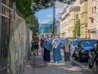 Three Women Walking In Central Berlin