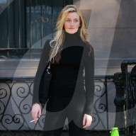 Sarah Pidgeon is spotted in a black sweater and pants with loafers filming 'American Love Story' in East Village in New York City