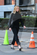 Sarah Pidgeon is spotted in a black sweater and pants with loafers filming 'American Love Story' in East Village in New York City