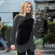 Sarah Pidgeon is spotted in a black sweater and pants with loafers filming 'American Love Story' in East Village in New York City