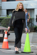 Sarah Pidgeon is spotted in a black sweater and pants with loafers filming 'American Love Story' in East Village in New York City