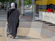 Woman Walking With Trolley In Berlin