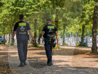 Police Patrol Opposite Holocaust Memorial In Berlin