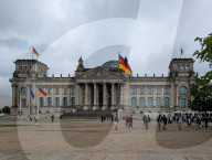 Tourist Groups Visit The Reichstag On A Rainy Day