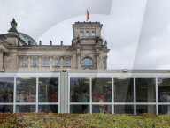 Tourist Groups Visit The Reichstag On A Rainy Day
