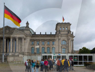 Tourist Groups Visit The Reichstag On A Rainy Day