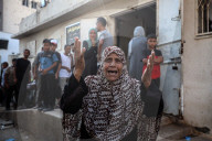 Relative of Journalist Killed in Overnight Airstrike Mourns at Gaza Hospital