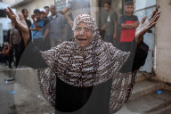 Relative of Journalist Killed in Overnight Airstrike Mourns at Gaza Hospital