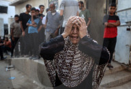 Relative of Journalist Killed in Overnight Airstrike Mourns at Gaza Hospital