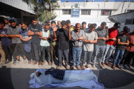 Relative of Journalist Killed in Overnight Airstrike Mourns at Gaza Hospital
