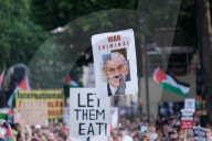 Pro-Palestine Demonstrators Demand An End To The Starvation Of Gazans In A Rally At Whitehall, London