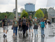 Youth Group Tour In Berlin Government District On Rainy Summer Day