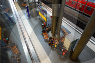 Travelers Waiting On Platform At Berlin Central Station