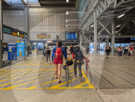 Cyclists With Bicycles In Munich Main Station Hall