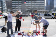 Seoul Activists Protest U.S. Tariff Pressure Across From Embassy, Signal Boycott Threat