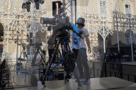 TV Cameraman Prepares For Live Broadcast