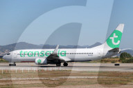 Diverse aircraft on the takeoff runway at Barcelona Airport