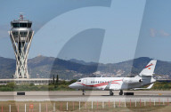 Diverse aircraft on the takeoff runway at Barcelona Airport