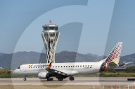Diverse aircraft on the takeoff runway at Barcelona Airport