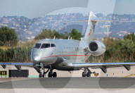 Diverse aircraft on the takeoff runway at Barcelona Airport